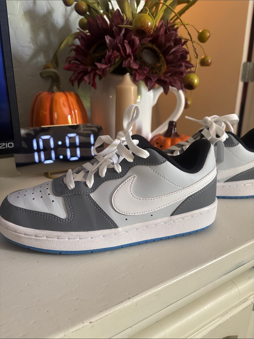 Nike Kids White and Gray Low-Top Sneakers with Blue Outsole